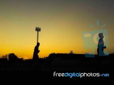 Silhouette Teen Age Run Together  Track Stock Photo