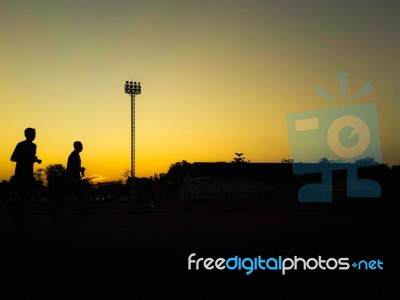 Silhouette Teen Age Run Together  Track Stock Photo