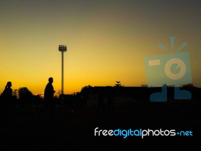 Silhouette Teen Age Run Together  Track Stock Photo