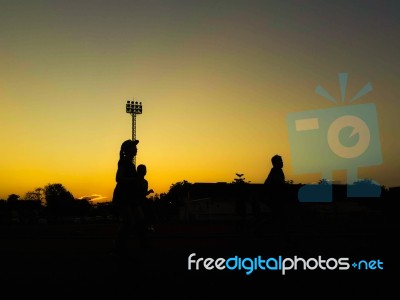 Silhouette Teen Age Run Together  Track Stock Photo