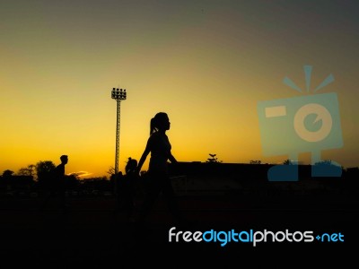 Silhouette Teen Age Run Together  Track Stock Photo