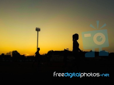 Silhouette Teen Age Run Together  Track Stock Photo