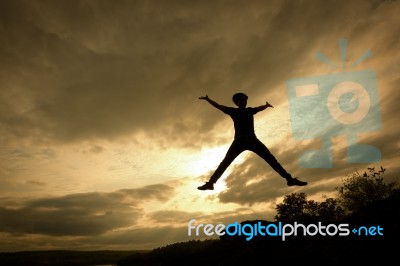 Silhouette Tourist Man Open Arm. He Is Happy In The Mountain. To… Stock Photo