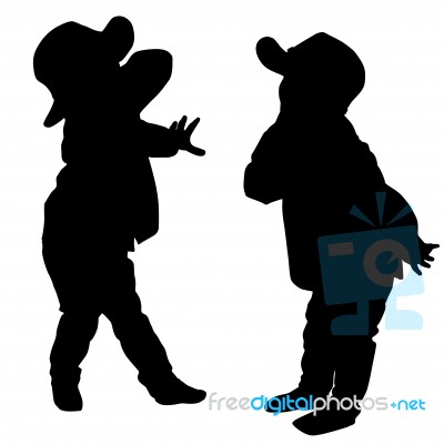 Silhouettes Of Two Little Boys Stock Photo