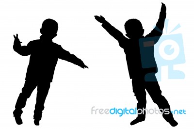 Silhouettes Of Two Little Boys Stock Photo