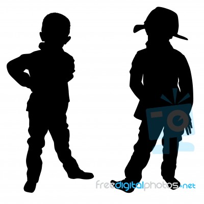 Silhouettes Of Two Little Boys Stock Photo