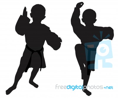 Silhouettes Of Two Little Boys Stock Photo