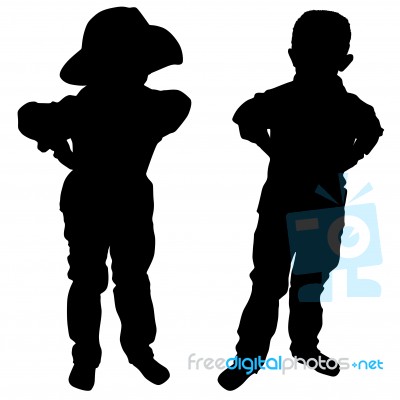 Silhouettes Of Two Little Boys Stock Photo