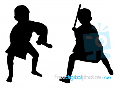 Silhouettes Of Two Little Boys Stock Photo