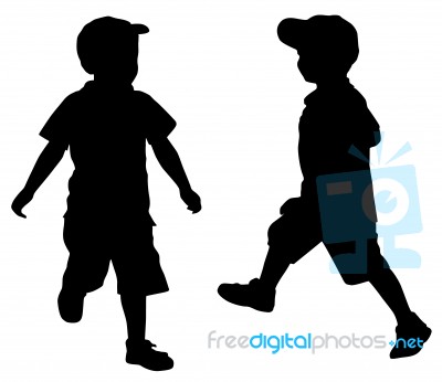 Silhouettes Of Two Little Boys Stock Photo