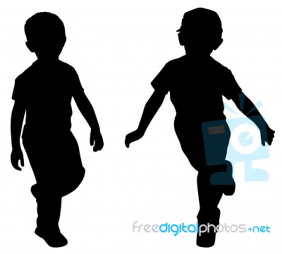 Silhouettes Of Two Little Boys Stock Photo