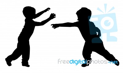 Silhouettes Of Two Little Boys Stock Photo