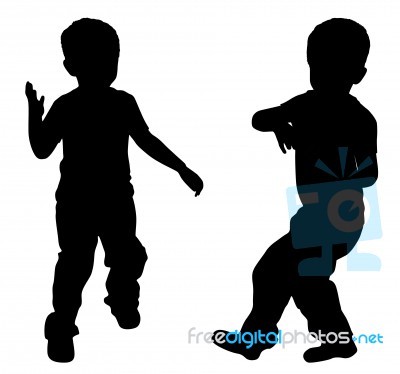 Silhouettes Of Two Little Boys Stock Photo