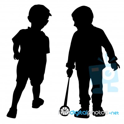 Silhouettes Of Two Little Boys Stock Photo