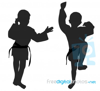 Silhouettes Of Two Little Boys Stock Photo