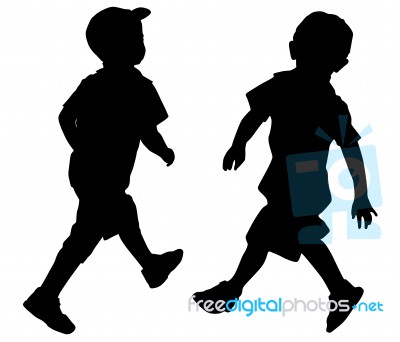 Silhouettes Of Two Little Boys Stock Photo