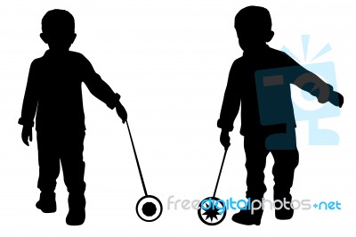 Silhouettes Of Two Little Boys Stock Photo