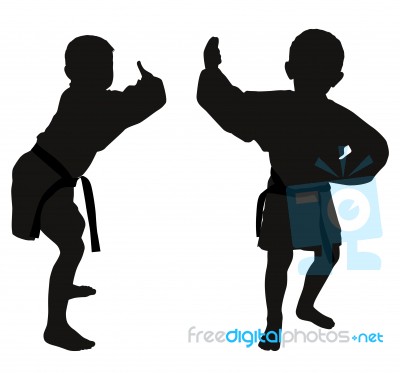 Silhouettes Of Two Little Boys Stock Photo