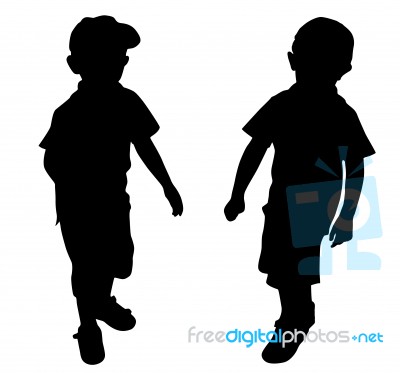 Silhouettes Of Two Little Boys Stock Photo