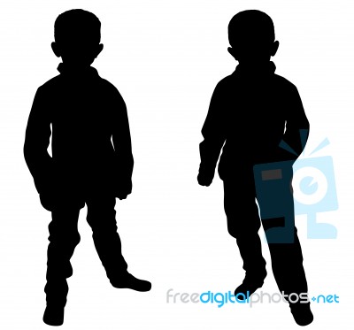 Silhouettes Of Two Little Boys Stock Photo