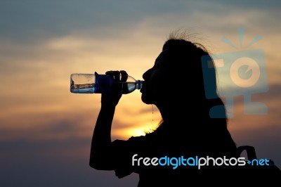 Silhouettes Of Women Stock Photo