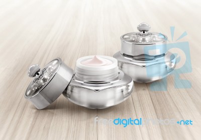 Silver Deluxe Cosmetic Jar On Wood Background Stock Photo