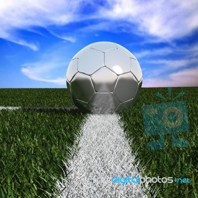 Silver Soccer Ball In Grass Stock Image