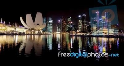 Singapore Skyline Illuminated At Night Stock Photo