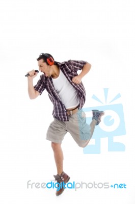 Singer Singing Loudly In To Microphone Stock Photo