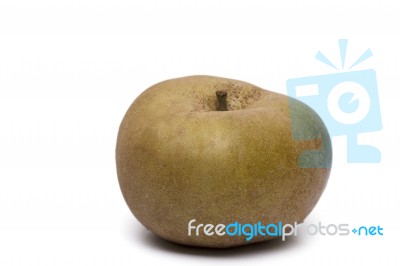 Single Fresh And Healthy Brown Apple Stock Photo