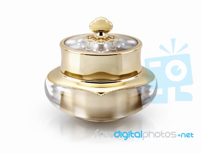 Single Golden Crown Cosmetic Jar On White Background Stock Photo