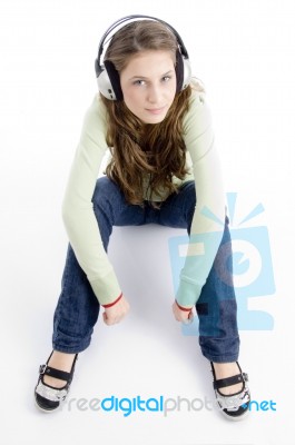 Sitting Female Listening Music Stock Photo