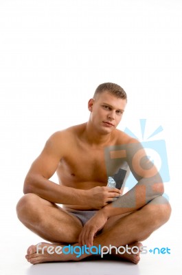 Sitting Muscular Guy With Chocolate Stock Photo