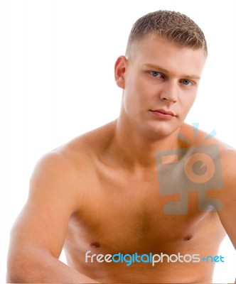 Sitting Muscular Male Stock Photo