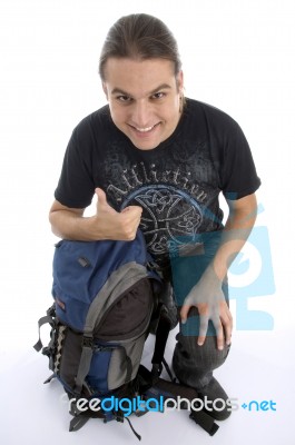 Sitting Traveler With Thumbs Up Stock Photo