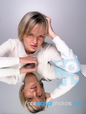 Sitting Young Woman Stock Photo