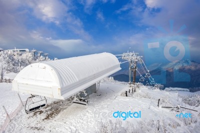 Ski Chair Lift Is Covered By Snow In Winter,deogyusan Mountains In South Korea Stock Photo