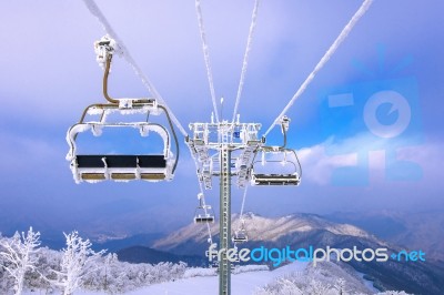 Ski Chair Lift Is Covered By Snow In Winter,deogyusan Mountains In South Korea Stock Photo