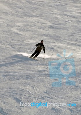 Skier In Powder Snow Stock Photo