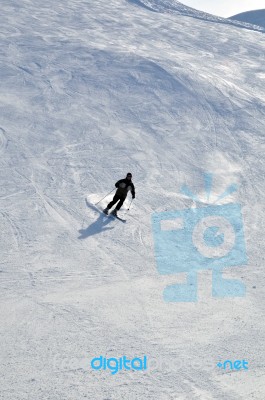 Skier In Powder Snow Stock Photo