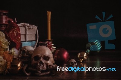 Skull And Gifts On Wooden Stock Photo