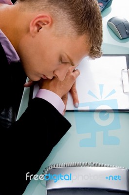 Sleeping Employee at his desk Stock Photo