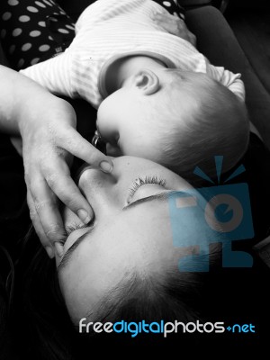 Sleeping Mother And Baby Stock Photo