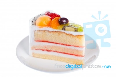 Slice Of Beautiful Cake With Fresh Fruits. Isolated On White Stock Photo