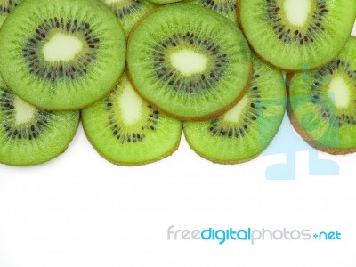 Slice Of Fresh Juicy Delicious And Healthy Kiwi Fruit, Isolated Stock Photo