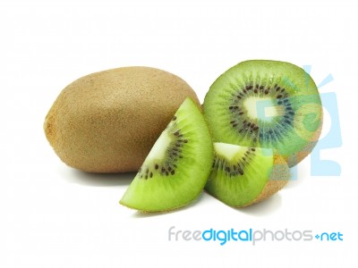 Slice Of Fresh Juicy Delicious And Healthy Kiwi Fruit, Isolated Stock Photo