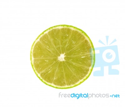 Slice Of Fresh Lime Isolated On White Background Stock Photo