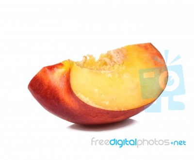 Slice Of Nectarine Isolated On White Background Stock Photo