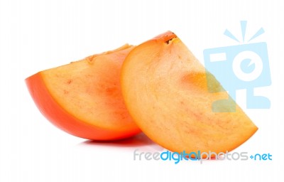 Slice Of Persimmon Isolated On The White Background Stock Photo