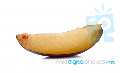 Slice Of Plum Isolated On The White Background Stock Photo